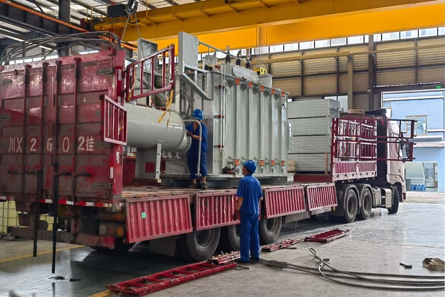 20000kVA oil-immersed transformer loaded on truck in workshop ready for dispatch — Zhongxin General factory