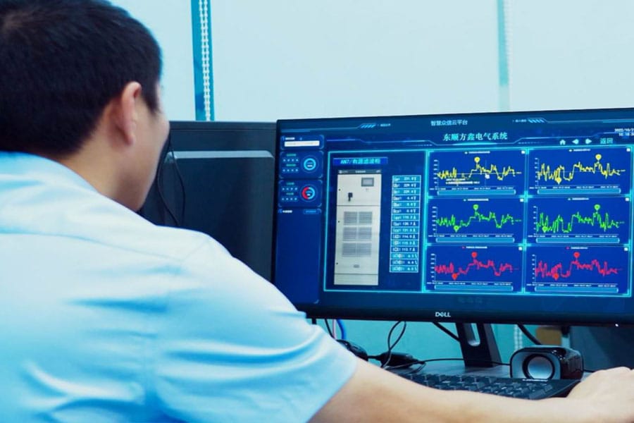 Zhongxin General technical engineers analysing customer electrical system operational data — Sichuan China