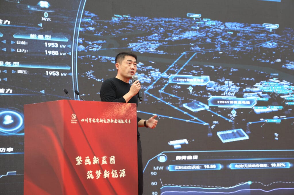 Professor Wei Zhenbo from Sichuan University demonstrates virtual power plant system at Boruian ceremony