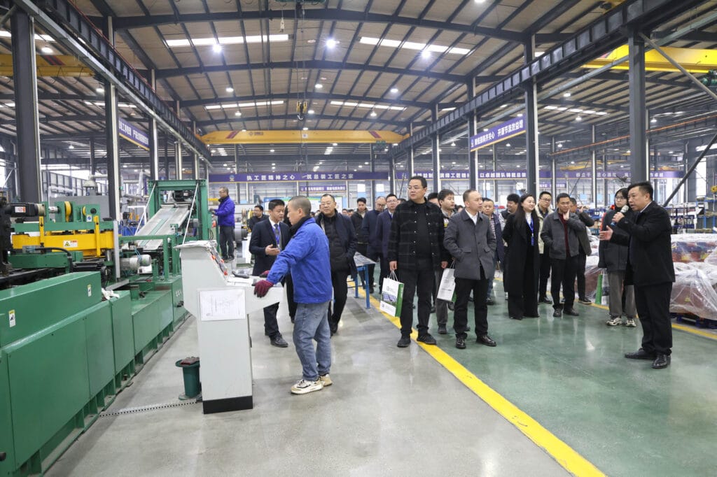 Distinguished guests tour Zhongxin General's existing manufacturing facility after Boruian ceremony