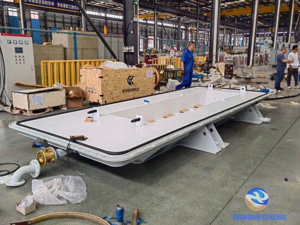 Complete transformer tank bottom shell and mounting base for 110kV 63MVA oil-immersed power transformer with bell-type upper tank design at ZX TRANSFORMER factory