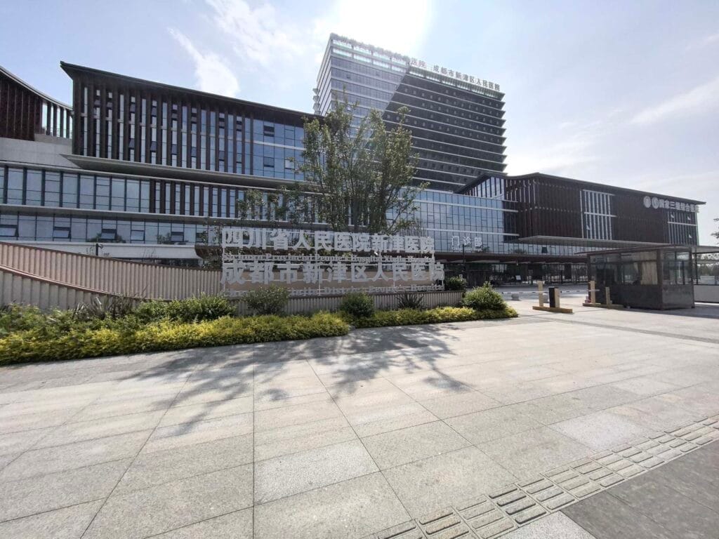 Front Exterior View of Xinjin District People's Hospital new campus in Chengdu, a modern 129,900 square meter healthcare facility powered by Zhongxin General intelligent power system