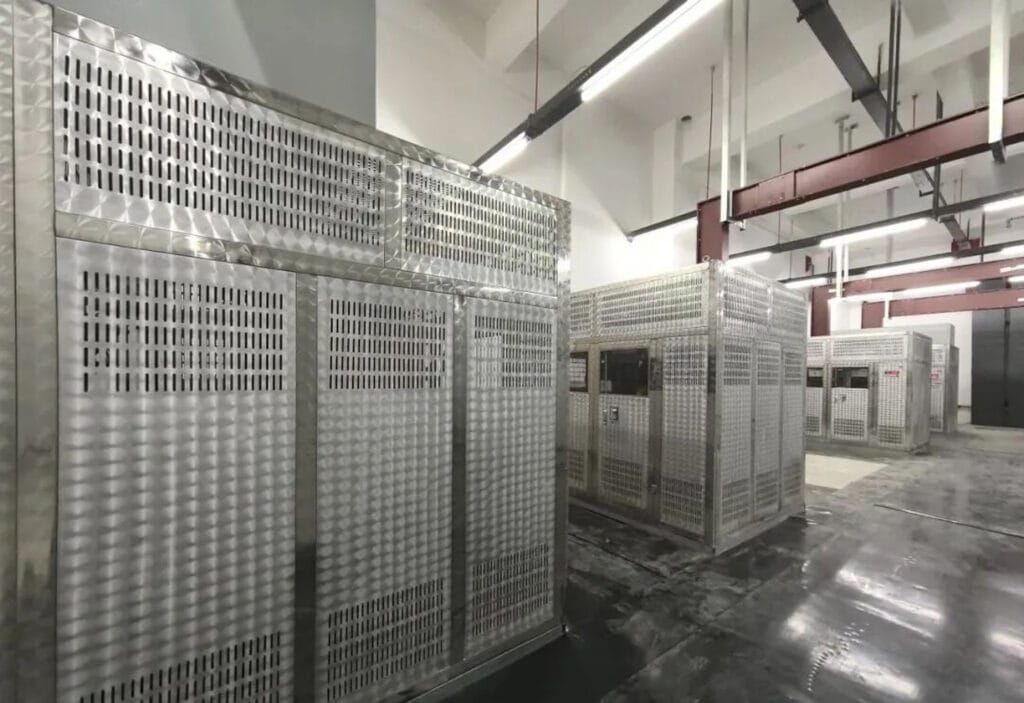 Multiple stainless steel enclosure dry-type transformers in Xinjin Hospital power distribution room by Zhongxin General