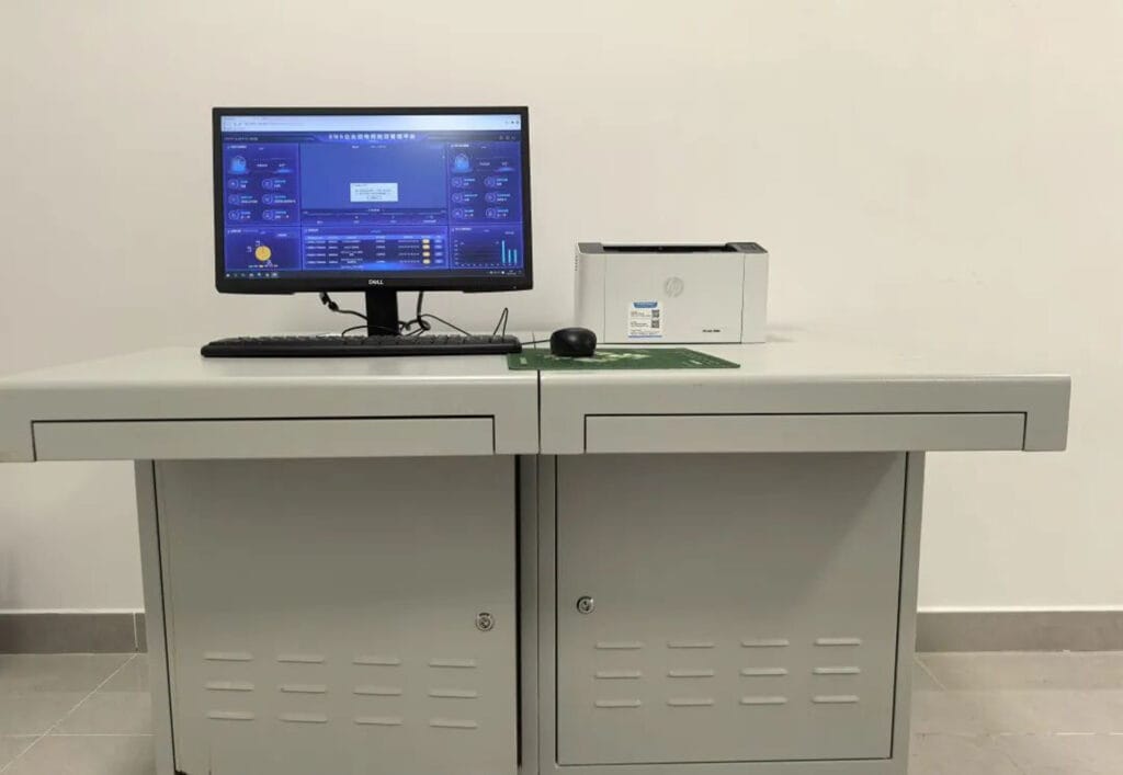 Central monitoring control center displaying Zhongxin General's Three-in-One intelligent power management system for Xinjin Hospital