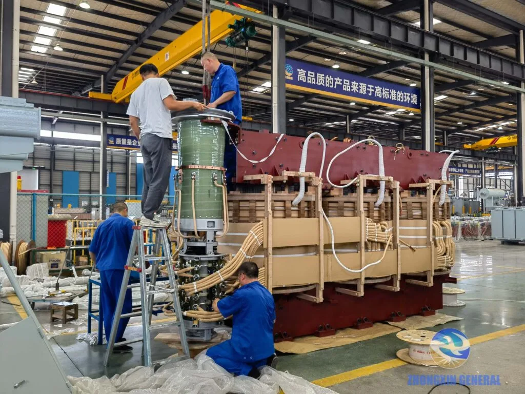 Professional technician installing OLTC mechanism on 63MVA 110kV oil-immersed power transformer manufactured by Zhongxin General for Ningxia LNG project