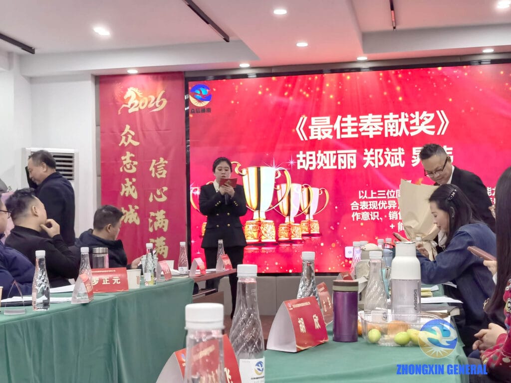 Marketing center staff presenting Best Contribution Award to outstanding sales personnel