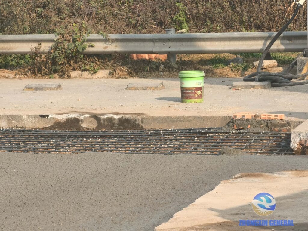Dense steel rebar grid for heavy-duty truck charging station ground reinforcement renovation close-up view