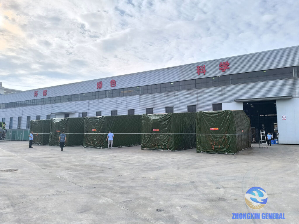 Five packaged prefabricated substation transport modules ready for crane loading at Zhongxin General Chengdu factory — Kazakhstan Aktau port project