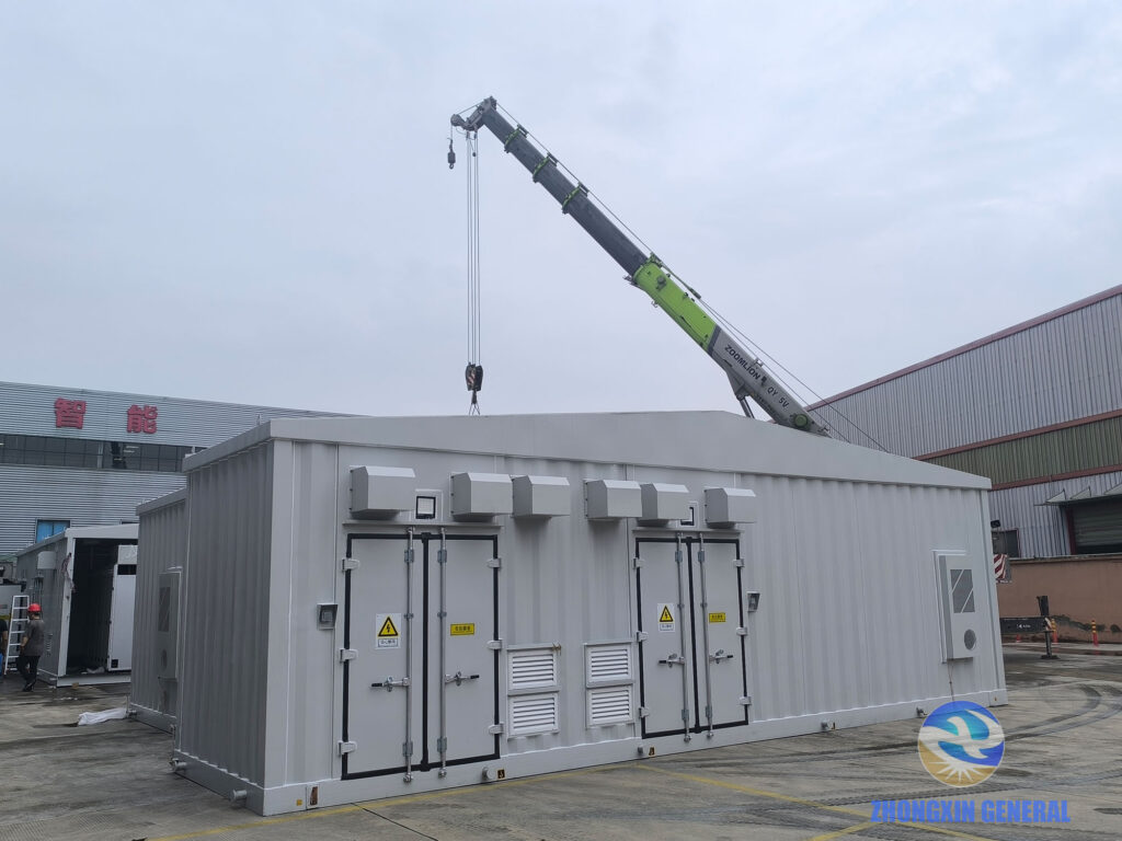Outdoor crane separating assembled prefabricated substation into transport modules at Zhongxin General Chengdu factory — Kazakhstan project