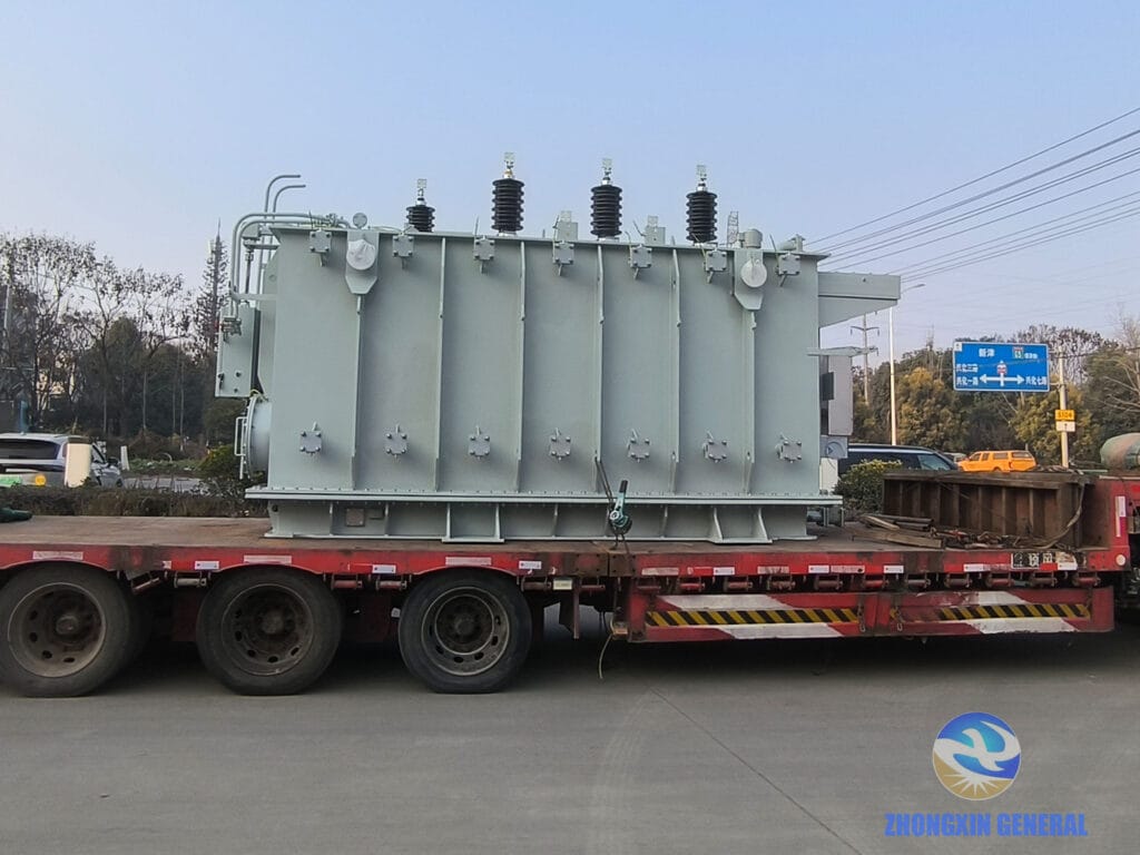 31500 kVA OLTC transformer on heavy transport truck side view — ZHONGXIN GENERAL delivery January 2026
