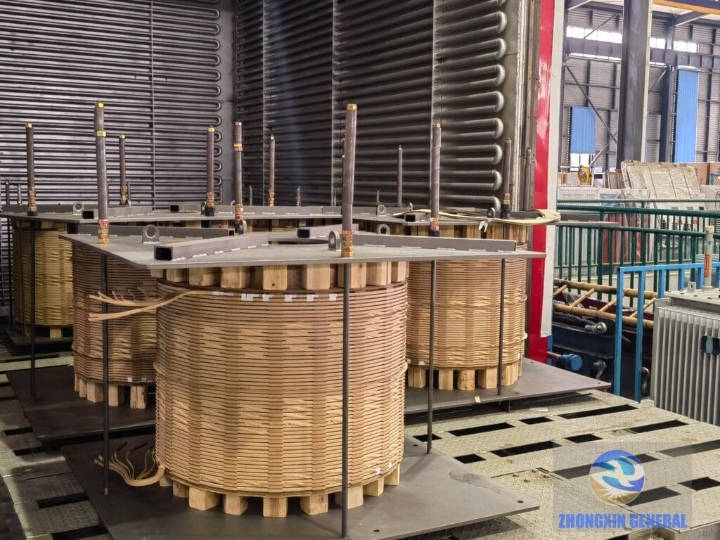 Transformer windings entering vacuum drying oven — 31500 kVA OLTC transformer manufacturing ZHONGXIN GENERAL