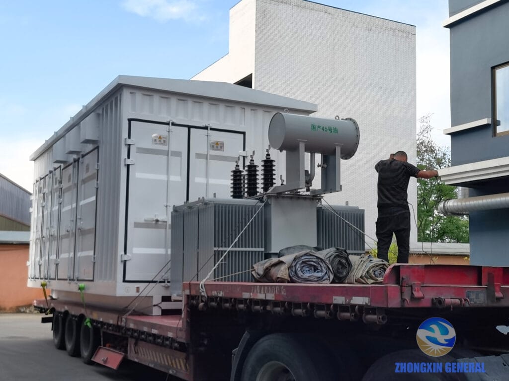 Second prefabricated box substation further cargo securing in progress — Zhongxin General Xinjiang oilfield dispatch April 2026