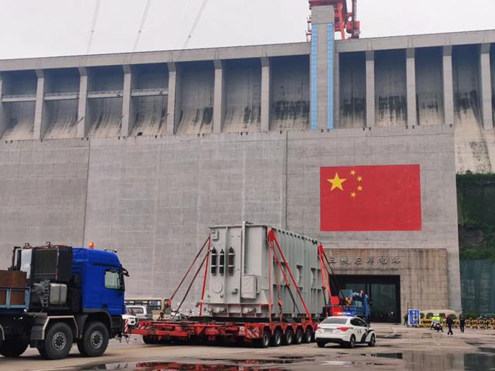 500 kV power transformer on heavy transport trailer entering Three Gorges Left Bank power station gate, 2020