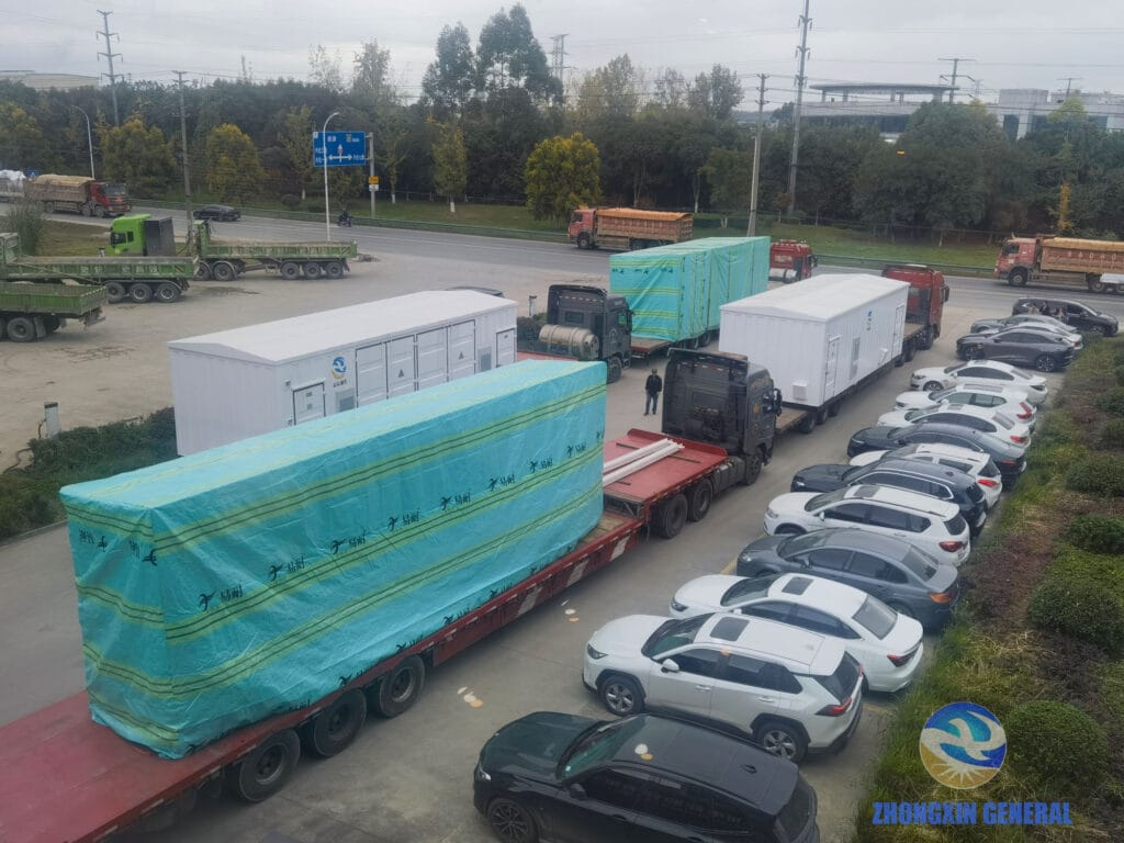 Four trucks loaded with prefabricated substation modules at Zhongxin General factory gate — Yichuan LNG Yan'an Shaanxi November 2025