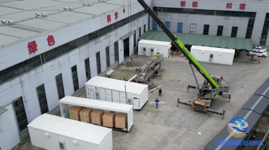 Prefabricated substation modules crane-lifted for loading — Zhongxin General Yichuan LNG project dispatch November 2025