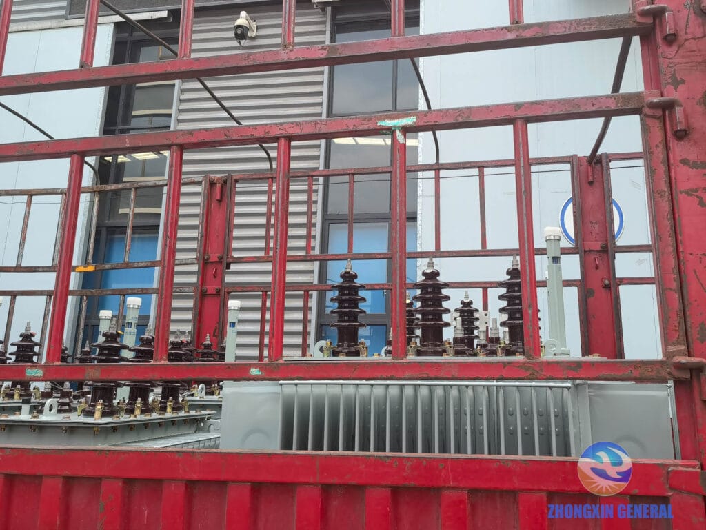 Batch of oil-immersed distribution transformers prepared for dispatch — loading and securing detail Zhongxin General