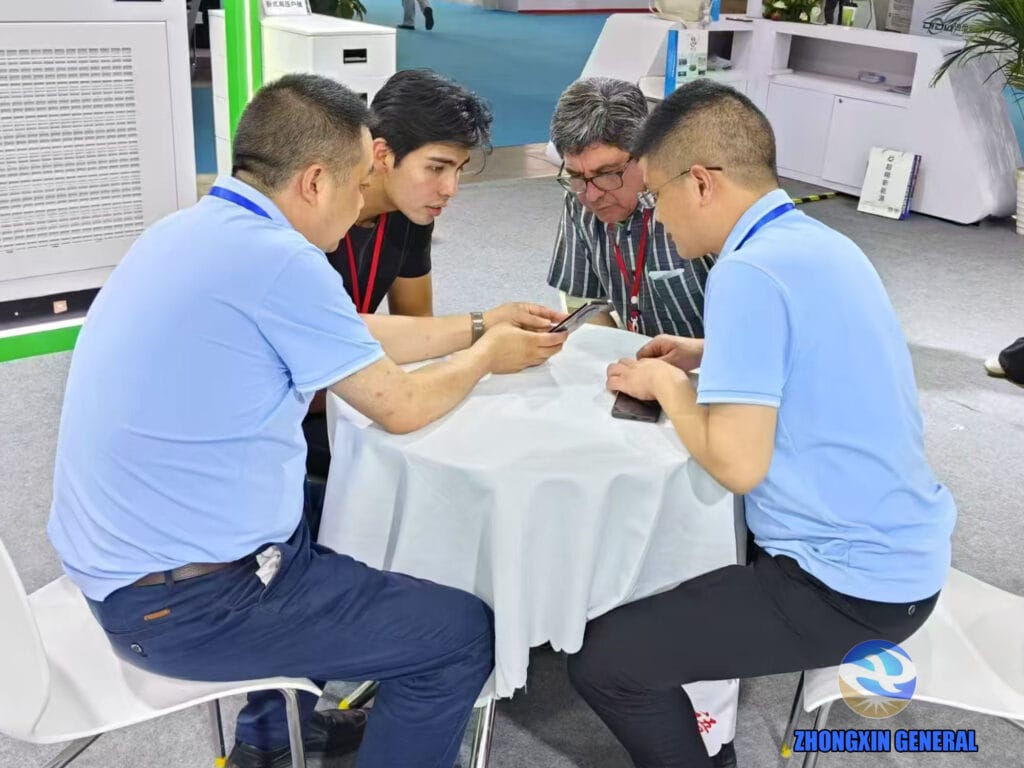 Zhongxin General team receiving Peruvian energy storage project clients at the exhibition booth during the 2025 China International Power Industry Expo in Chengdu