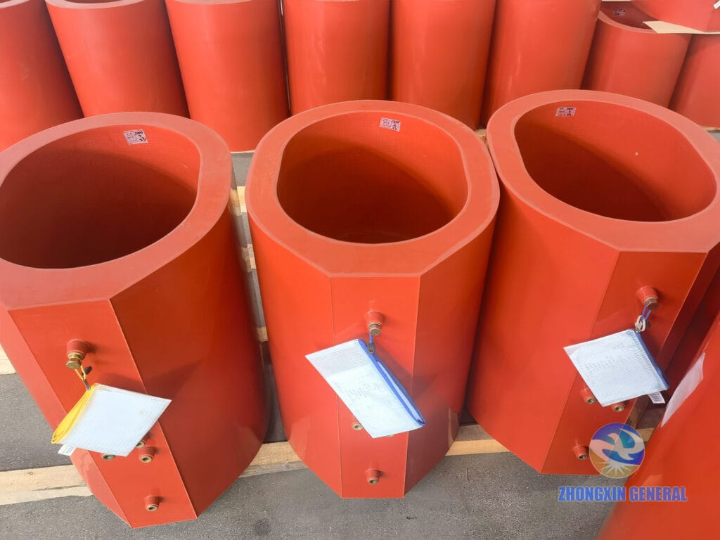 High-voltage epoxy cast winding coils of 1000 kVA dry-type transformer displayed after demoulding — glass fiber reinforced encapsulation Zhongxin General