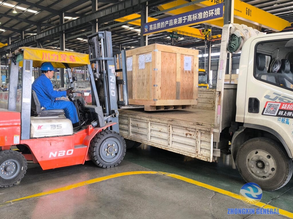 Export-wooden-crated 1250 kVA dry-type transformer being loaded onto truck for air freight to Europe — Zhongxin General Sichuan