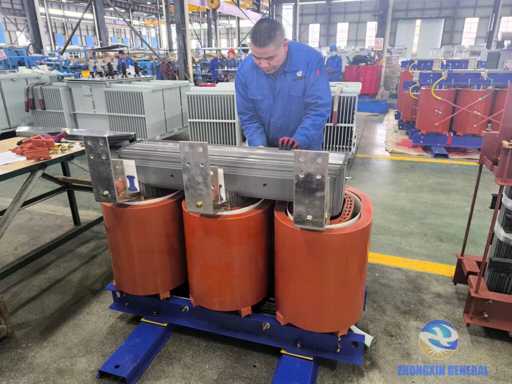 Experienced senior technician performing final assembly of 1250 kVA cast resin dry-type transformer — Zhongxin General Sichuan factory