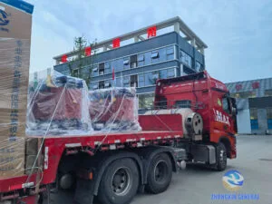 Two 1600 kVA all-copper cast resin dry-type transformers loaded on trucks for domestic delivery — Zhongxin General Sichuan factory