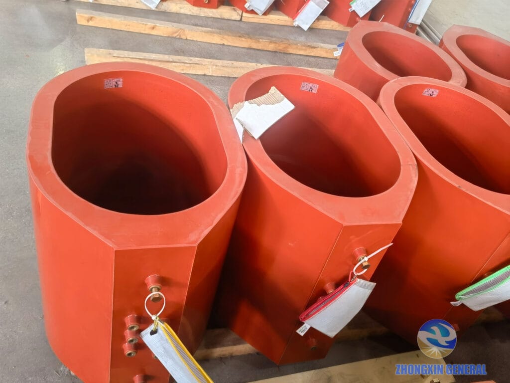 High-voltage epoxy cast winding coils of 1600 kVA dry-type transformer displayed after demoulding — glass fiber reinforced encapsulation Zhongxin General