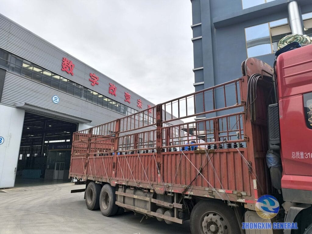 Truck carrying 200 kVA oil-immersed transformers departing Zhongxin General factory for customer delivery