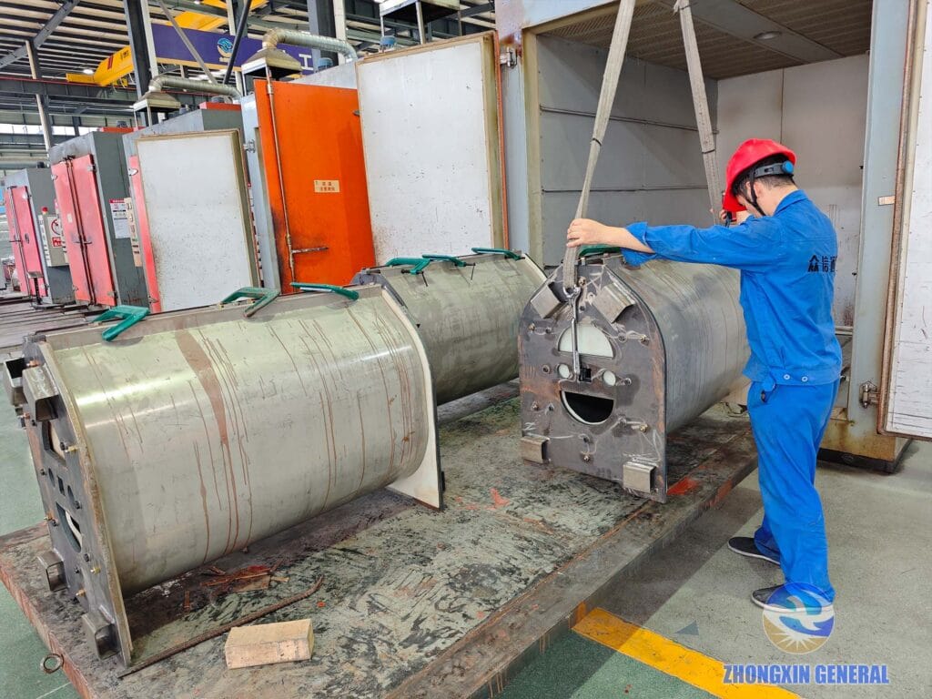 2500 kVA dry-type transformer being prepared for high-temperature curing by technician — Zhongxin General factory