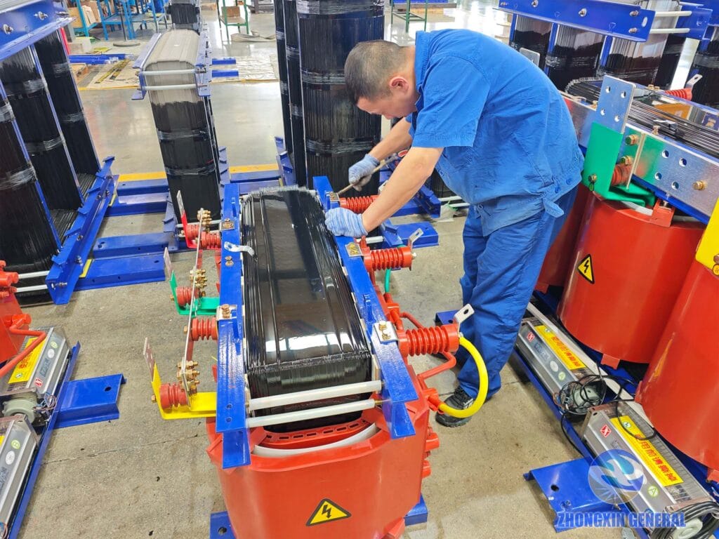 Senior technician performing final detail inspection on 250 kVA cast resin dry-type transformer before dispatch — Zhongxin General
