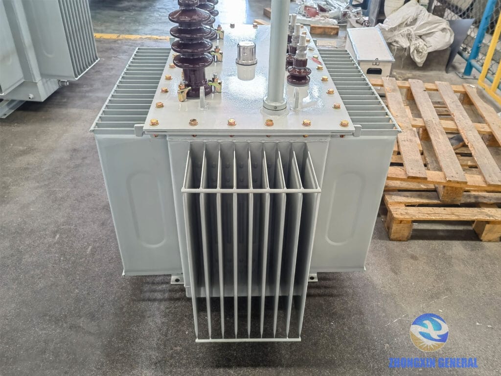 400 kVA oil-immersed transformer corrugated fin radiator tank close-up — ONAN natural cooling Zhongxin General