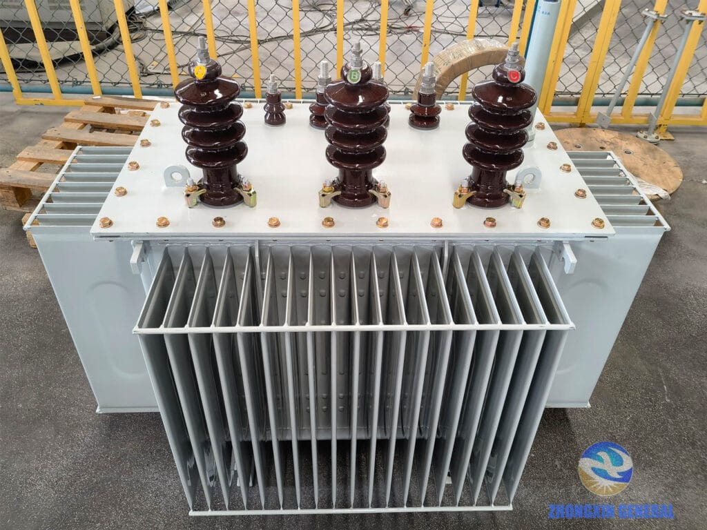400 kVA oil-immersed transformer winding assembly completed — high-voltage end close-up, tap connections visible, Zhongxin General