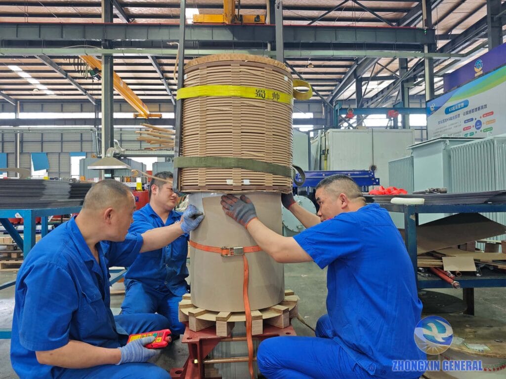 Core and coil assembly of 5000 kVA oil-immersed transformer in progress — Zhongxin General Sichuan factory