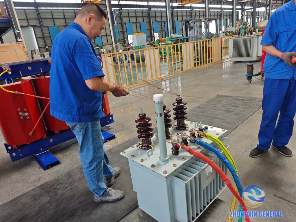 50 kVA oil-immersed transformer undergoing factory acceptance testing — Zhongxin General test area