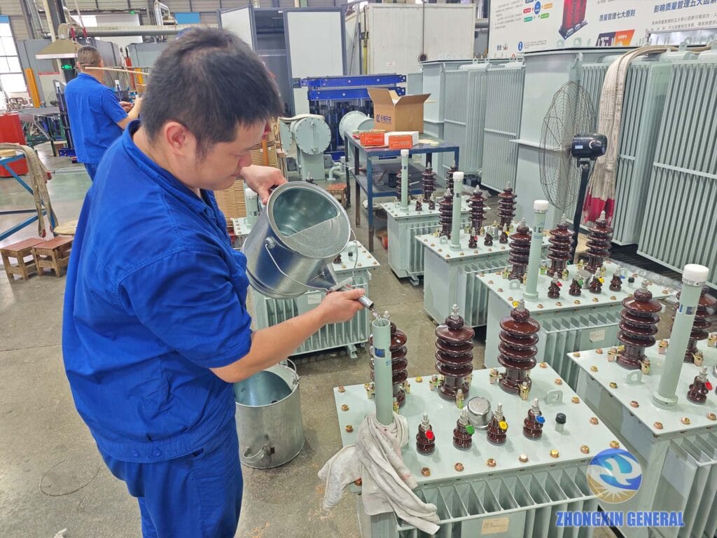 Insulating oil being filled into 50 kVA transformer through multifunctional tubular oil level gauge — Zhongxin General