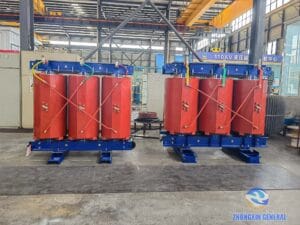 Two 6300 kVA cast resin dry-type transformers awaiting factory acceptance testing in test workshop — Zhongxin General