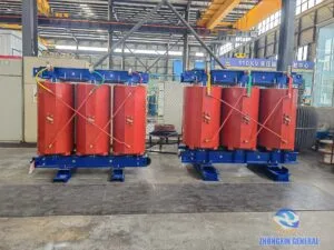 Two 6300 kVA cast resin dry-type transformers awaiting factory acceptance testing in test workshop — Zhongxin General