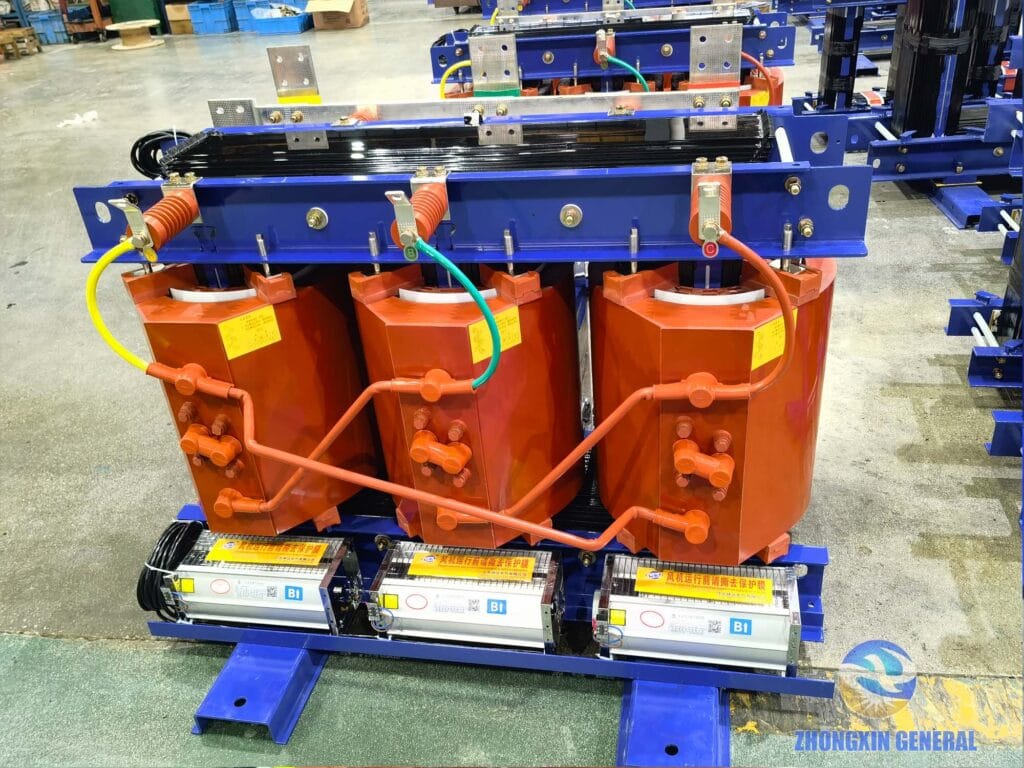 630 kVA dry-type transformer body and structural clamping frame connection — LV winding cooling air ducts visible Zhongxin General