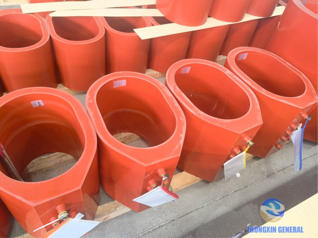 High-voltage epoxy cast winding coils of 630 kVA dry-type transformer displayed after demoulding — glass fiber reinforced encapsulation Zhongxin General