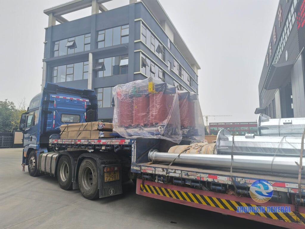 Two 1000 kVA all-copper cast resin dry-type transformers loaded on truck for domestic delivery — Zhongxin General Sichuan factory