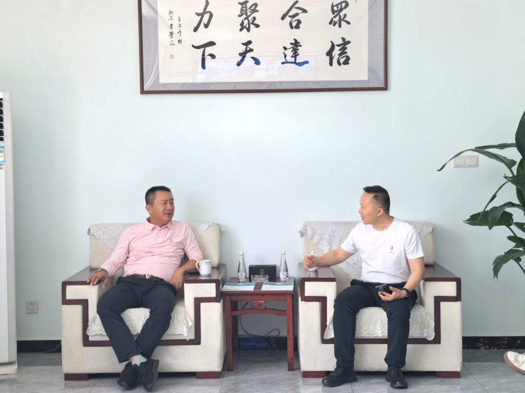 Mr. Feng Zhenyu and Deputy Director Tang Hao in discussion at Zhongxin General meeting room — Chengdu June 2026
