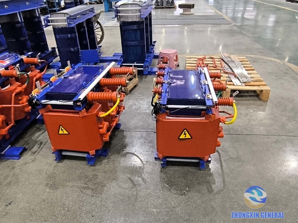 30 kVA dry-type transformer HV and LV windings after epoxy vacuum casting and hot-air oven curing — Zhongxin General factory