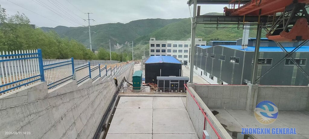 Two distribution switchgear panels at Shunhong Environmental 35kV substation — factory buildings in background Ganlo Industrial Zone Sichuan