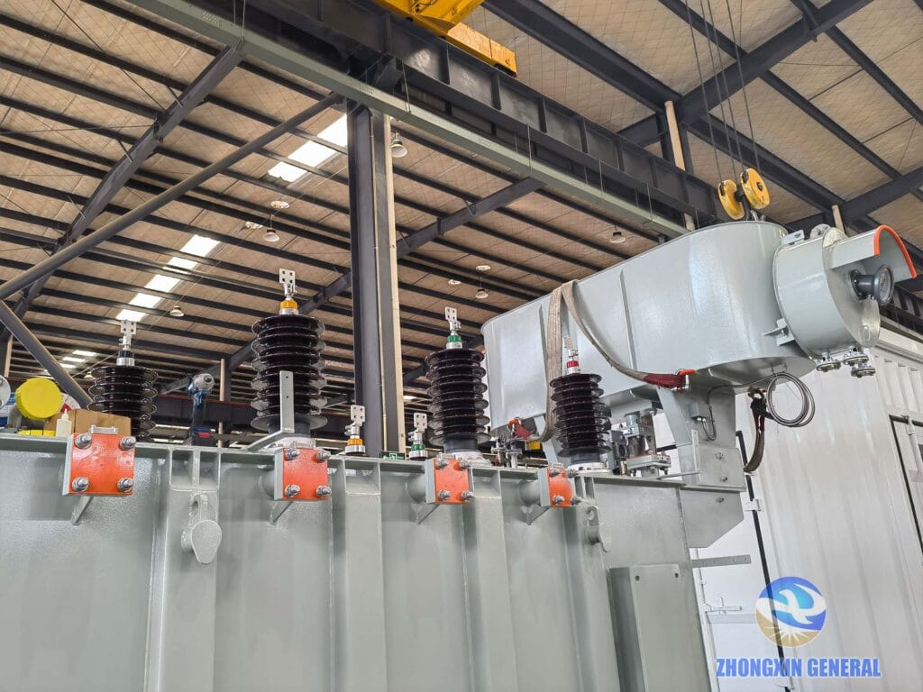 Close-up of top HV insulator bushing on 16000 kVA oil-immersed transformer — 35kV class Zhongxin General