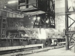 1930s British hot-rolling mill workshop producing early hot-rolled silicon steel