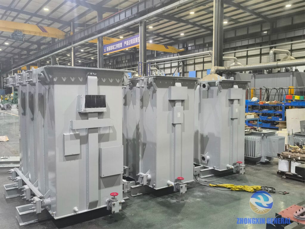 Side view close-up of 6300 kVA oil-immersed transformer showing radiator fins and bushings — Zhongxin General