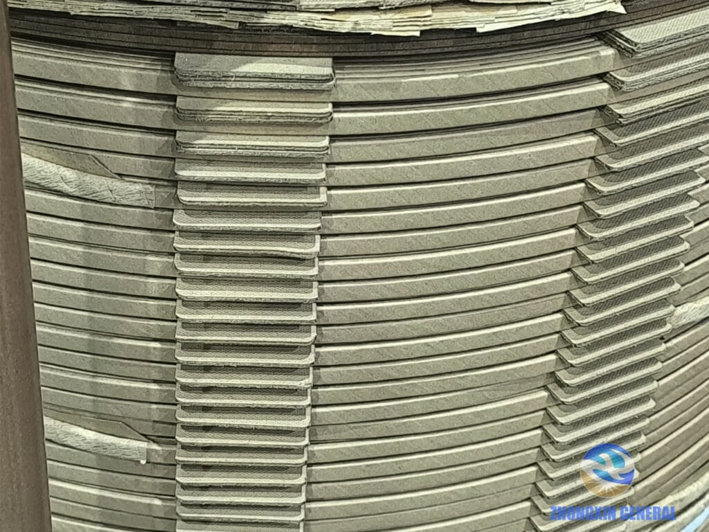 Macro close-up of internal insulation and cooling ducts inside 6300 kVA transformer winding — Zhongxin General