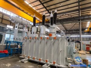 Completed 8000kVA SZ20-8000/120 OLTC transformer front view — HV bushings and conservator tank Zhongxin General