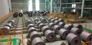Finished grain-oriented silicon steel coils stacked in China Baowu Steel Group's storage yard