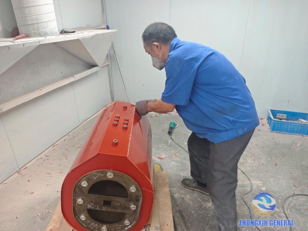 Worker polishes and trims high-low voltage winding surface