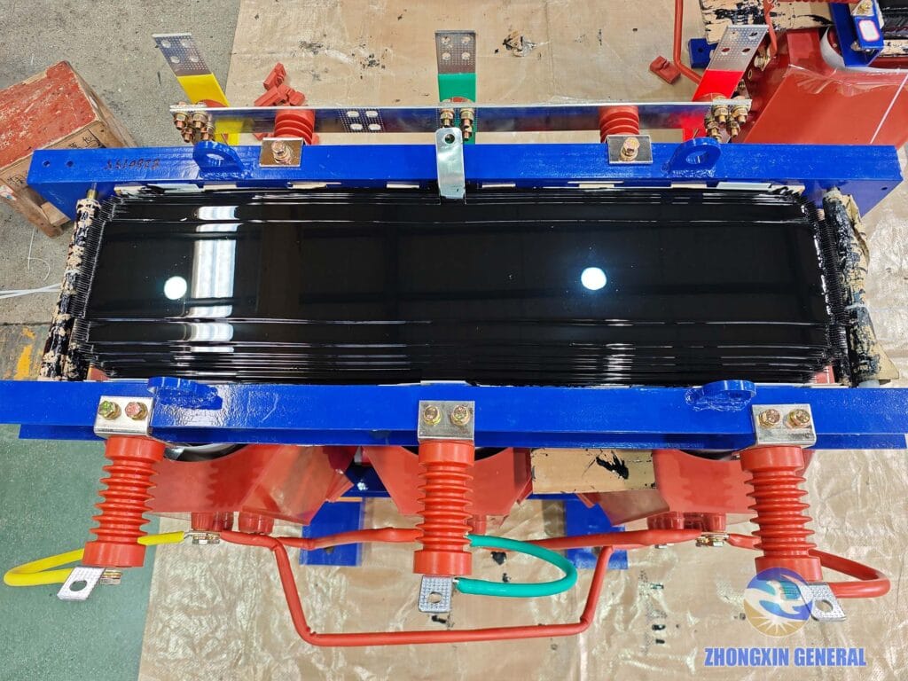 Close-up of varnished dry-type transformer core top drying naturally